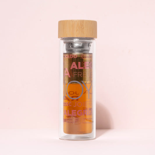 Bottiglia in vetro con infusore.