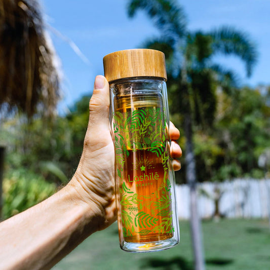 Bottiglia in vetro con infusore.